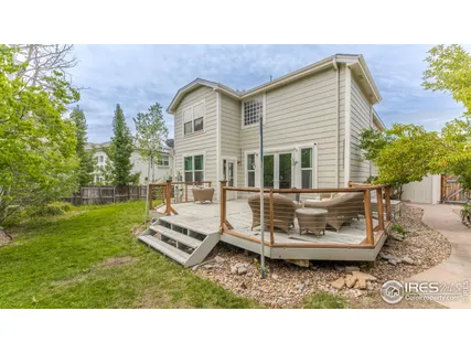 a backyard with a garden and entertaining space