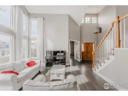 a kitchen with stainless steel appliances kitchen island granite countertop a sink and cabinets