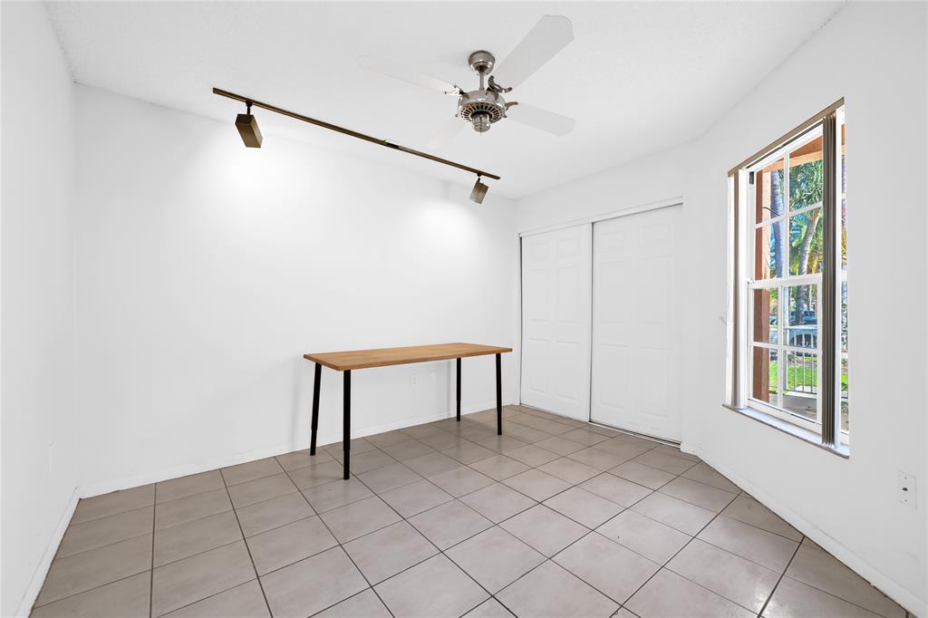 8245 Northwest 70th Street Tamarac, FL 33321 - Photo 21 of 29 a view of an empty room with a window