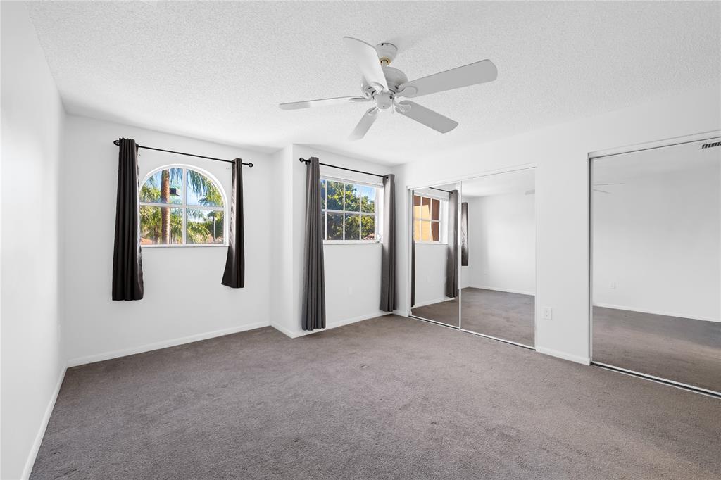 8245 Northwest 70th Street Tamarac, FL 33321 - Photo 23 of 29 a view of an empty room with window