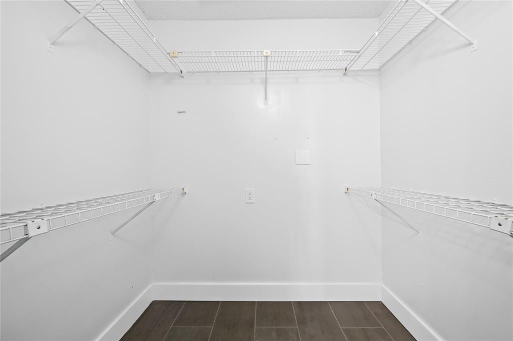 8245 Northwest 70th Street Tamarac, FL 33321 - Photo 24 of 29 a view of a room with racks on the wall