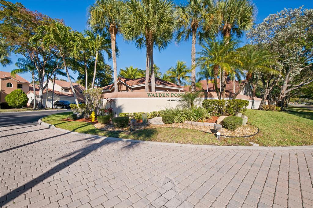 8245 Northwest 70th Street Tamarac, FL 33321 - Photo 29 of 29 a view of a backyard with swimming pool
