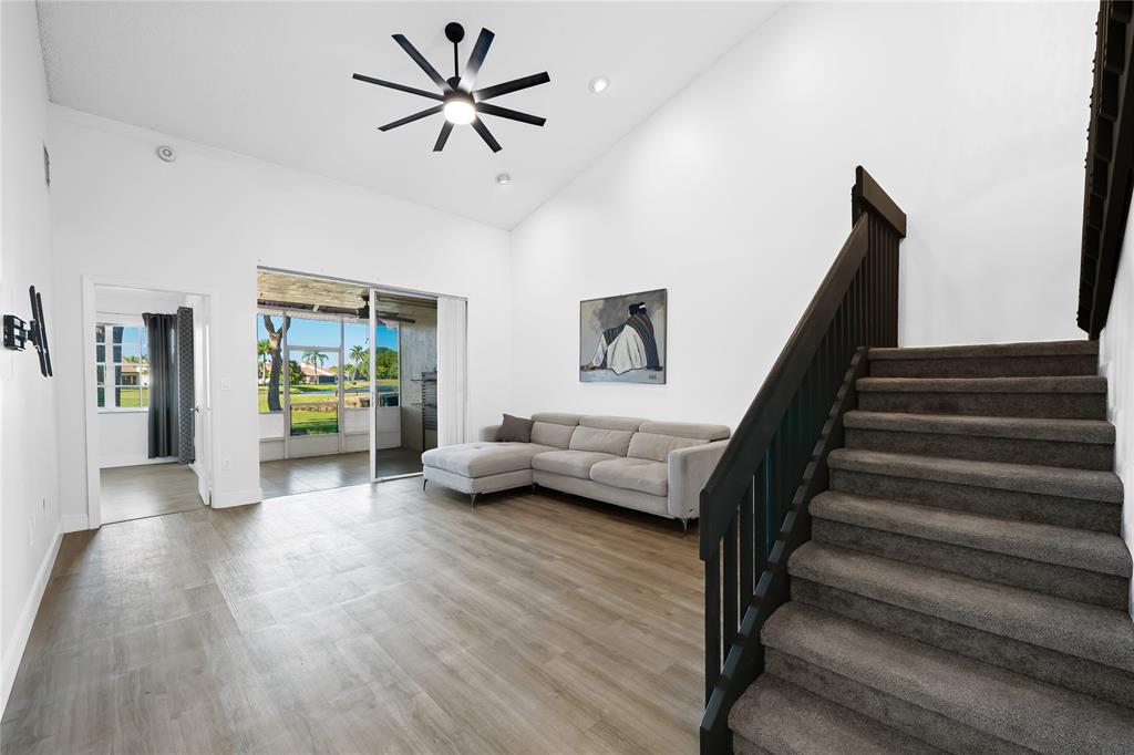 8245 Northwest 70th Street Tamarac, FL 33321 - Photo 6 of 29 a view of an empty room and wooden floor