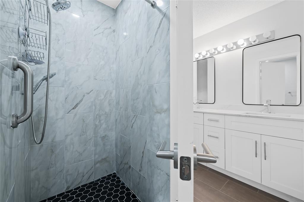 8245 Northwest 70th Street Tamarac, FL 33321 - Photo 10 of 29 a bathroom with a shower