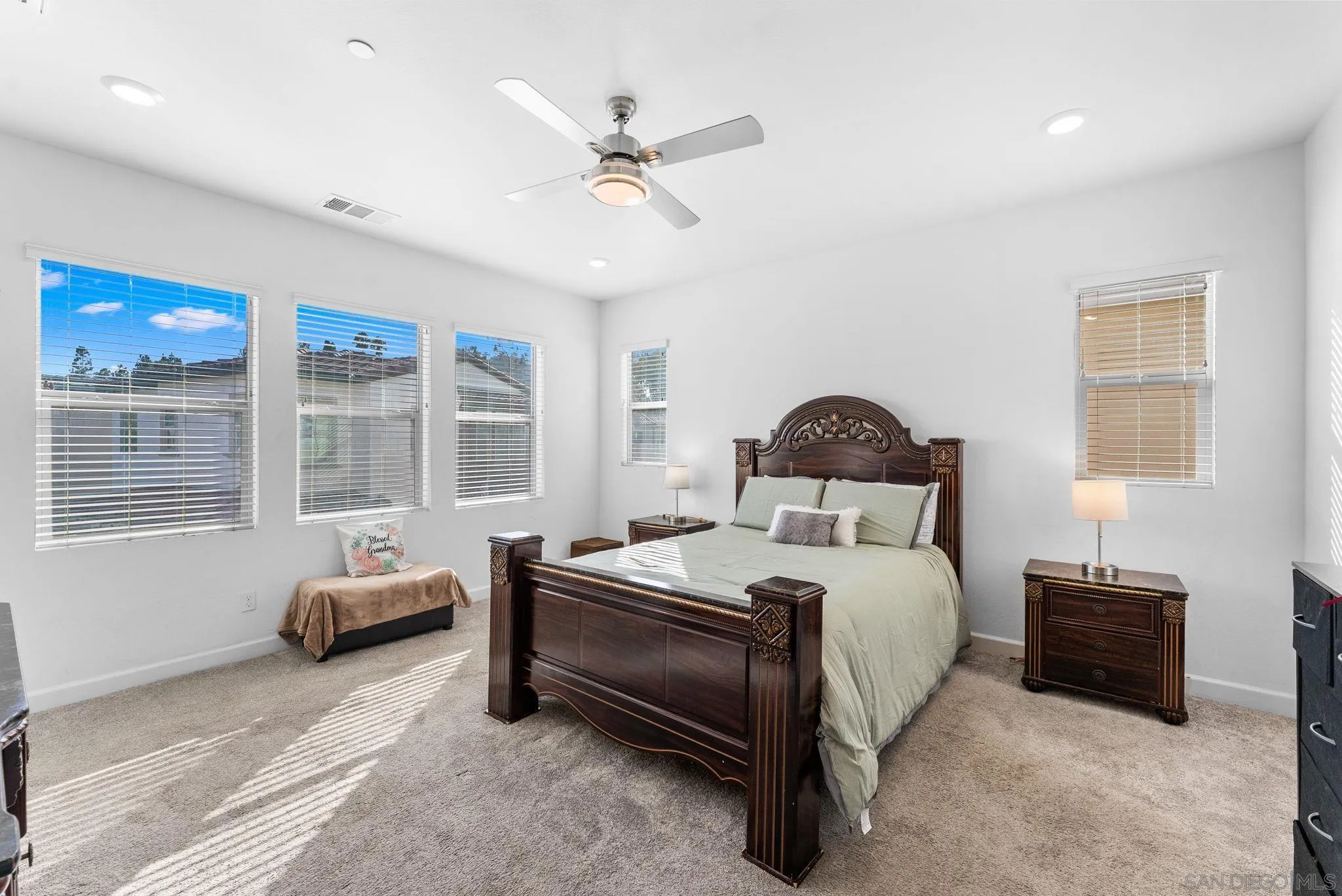 10129 Hercules Way Spring Valley, CA 91977 - Photo 16 of 52 a bedroom with a bed and a window