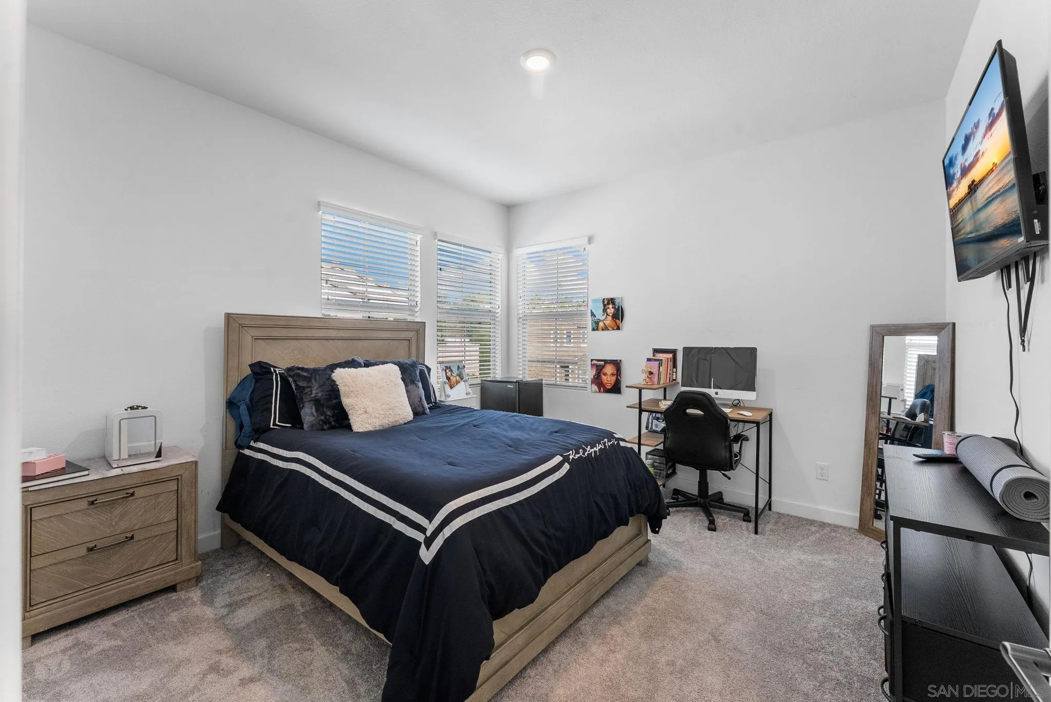 10129 Hercules Way Spring Valley, CA 91977 - Photo 20 of 52 a bedroom with a bed and a tv