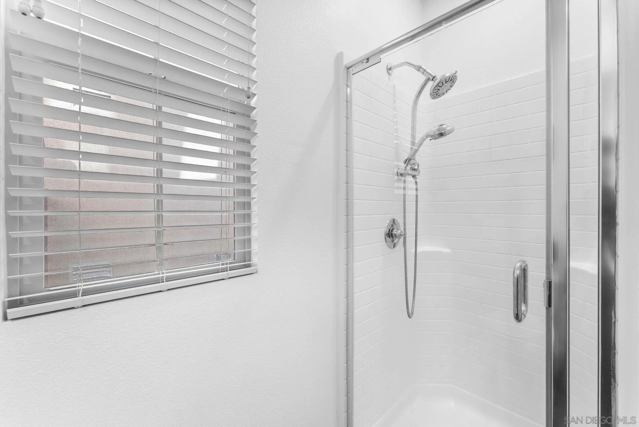 10129 Hercules Way Spring Valley, CA 91977 - Photo 26 of 52 a bathroom with a shower