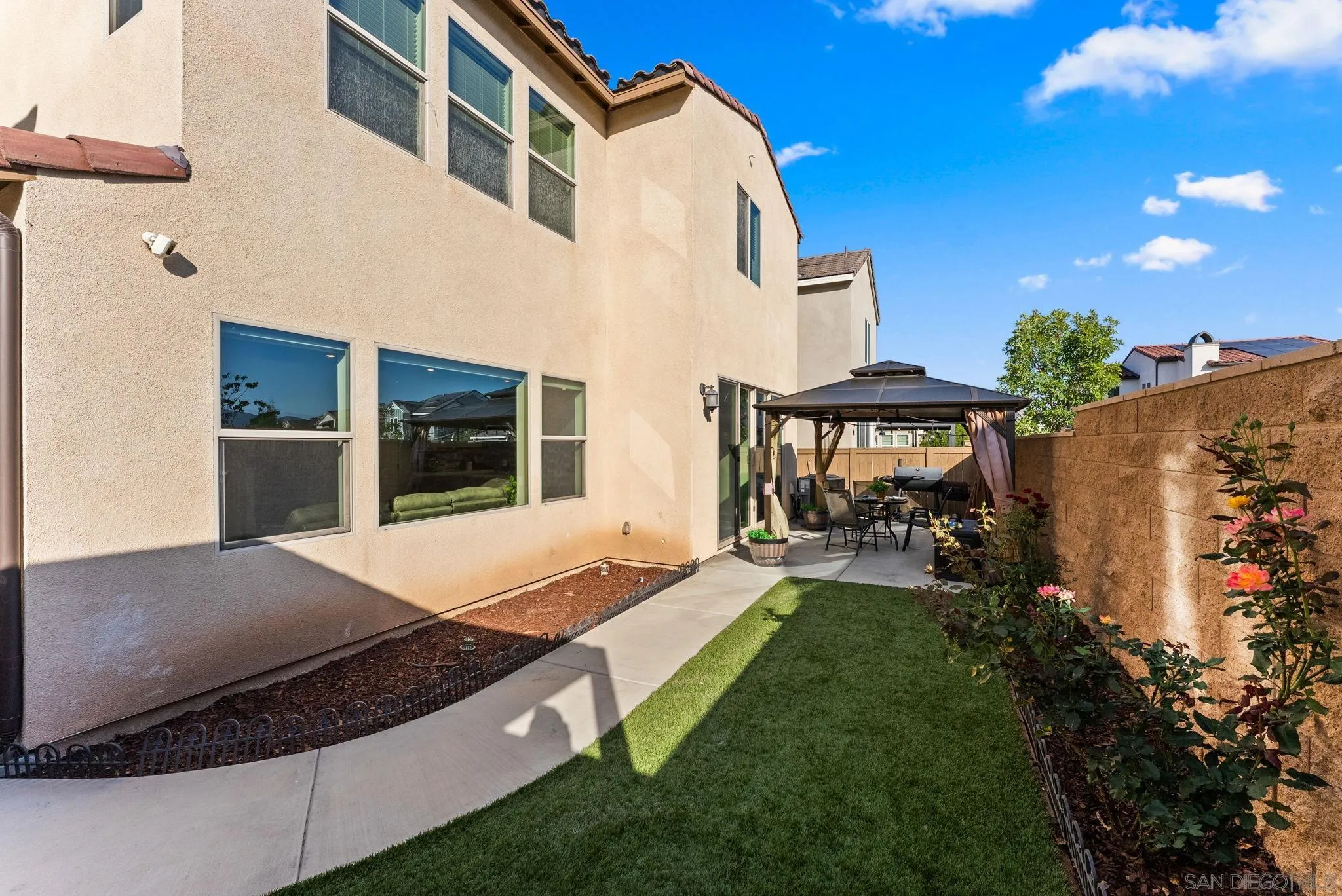 10129 Hercules Way Spring Valley, CA 91977 - Photo 28 of 52 a view of an house with backyard space and balcony
