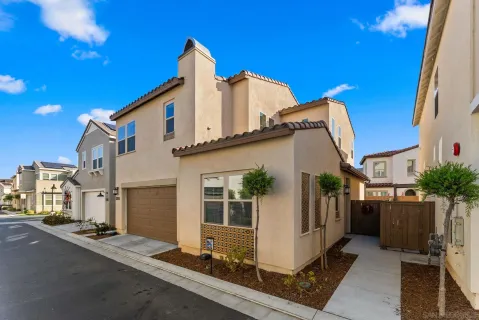 a view of a house with a street