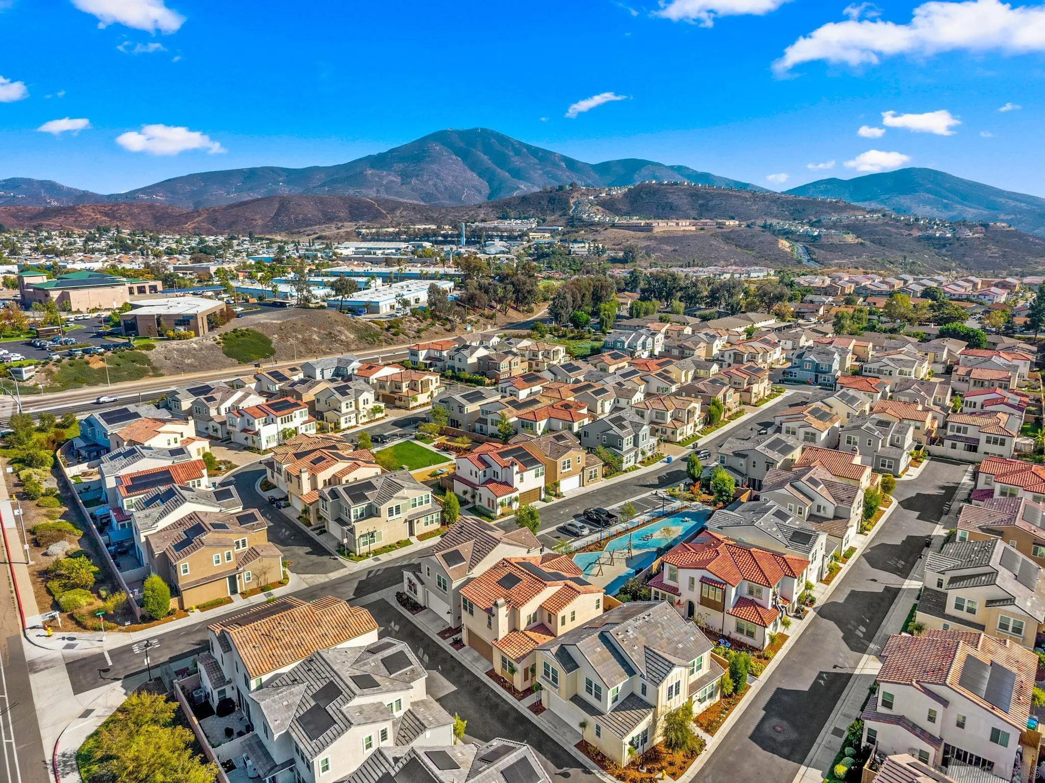 10129 Hercules Way Spring Valley, CA 91977 - Photo 40 of 52 an aerial view of residential houses with outdoor space and city view