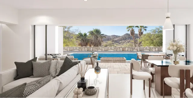 a living room with furniture a large window and a table