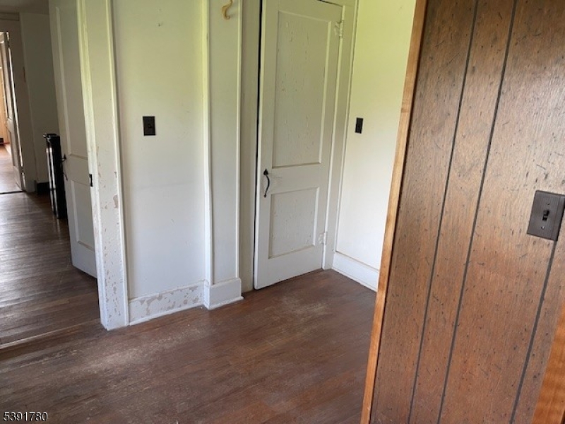 11 Creek Road Whitehouse Station, NJ 08889 - Photo 13 of 32 a view of a hallway with wooden floor