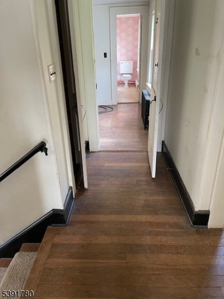 11 Creek Road Whitehouse Station, NJ 08889 - Photo 15 of 32 a view of a hallway view with wooden floor and staircase