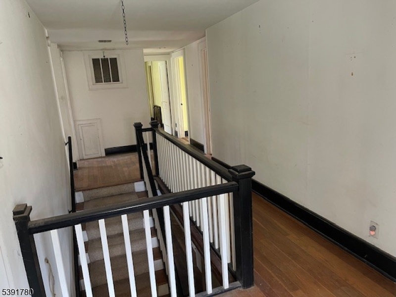 11 Creek Road Whitehouse Station, NJ 08889 - Photo 23 of 32 a view of a hallway with stairs