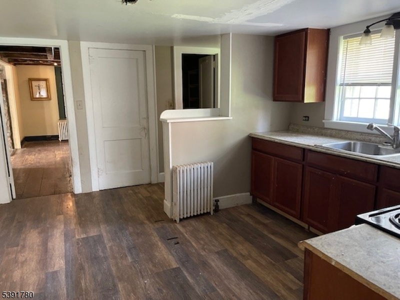 11 Creek Road Whitehouse Station, NJ 08889 - Photo 28 of 32 a view of kitchen with granite countertop cabinets and wooden floor