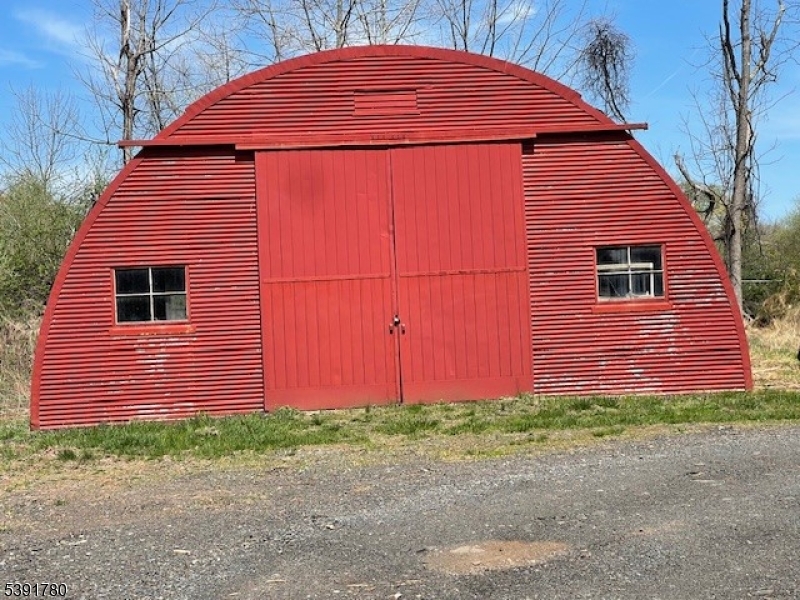 11 Creek Road Whitehouse Station, NJ 08889 - Photo 31 of 32 a backyard of a house with lots of green space