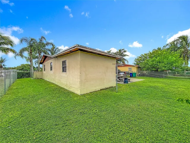 a view of a backyard with a garden