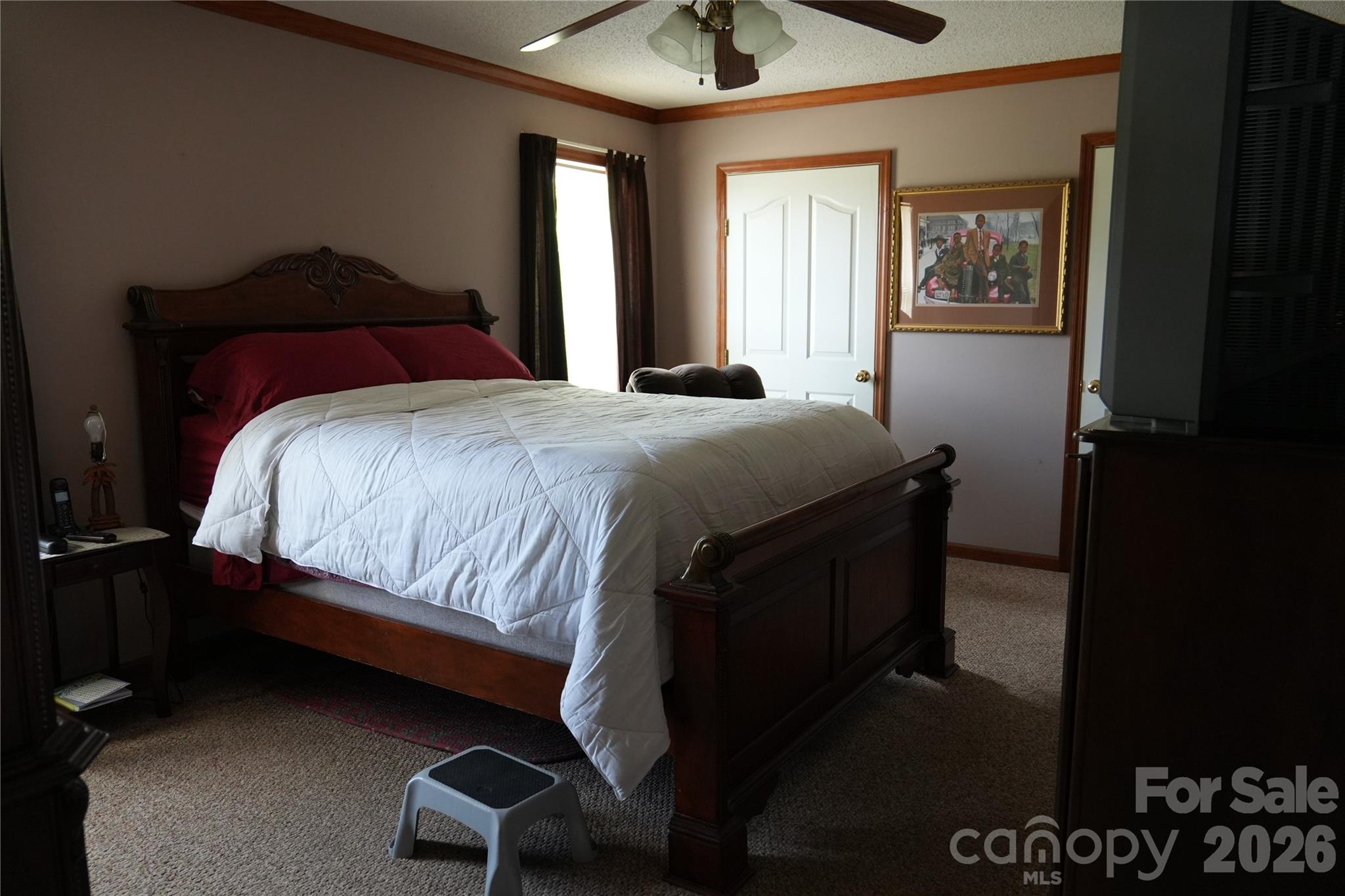 424 Press Walters Road Hartsville, SC 29550 - Photo 9 of 10 a bedroom with a bed and window