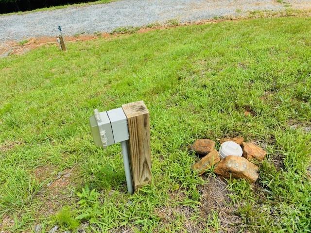 196 Moriah Drive Rutherfordton, NC 28139 - Photo 13 of 48 a backyard of a house with a yard and outdoor seating