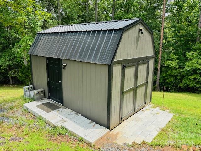 196 Moriah Drive Rutherfordton, NC 28139 - Photo 15 of 48 a backyard of a house with seating space