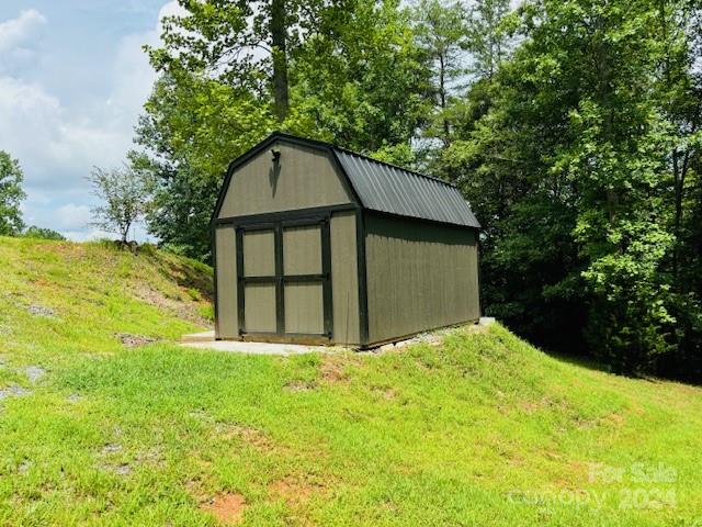 196 Moriah Drive Rutherfordton, NC 28139 - Photo 16 of 48 a house with trees in front of it