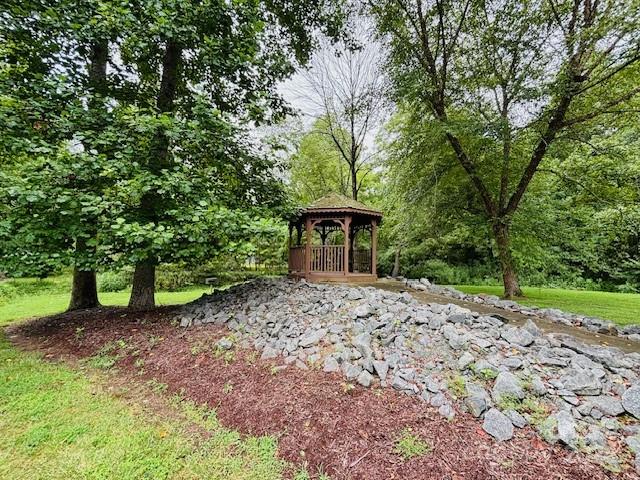 196 Moriah Drive Rutherfordton, NC 28139 - Photo 46 of 48 a view of a house with a yard and tree