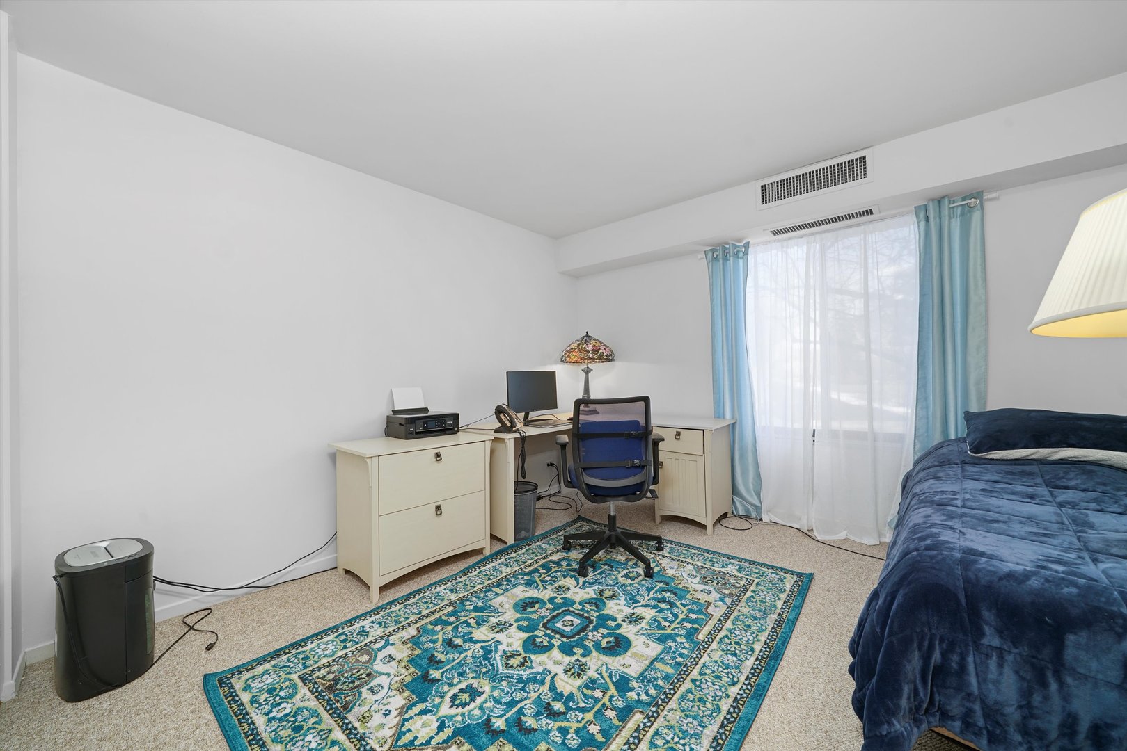 1405 East Central Road, Unit 110B Arlington Heights, IL 60005 - Photo 23 of 33 a view of a workspace with furniture and a window