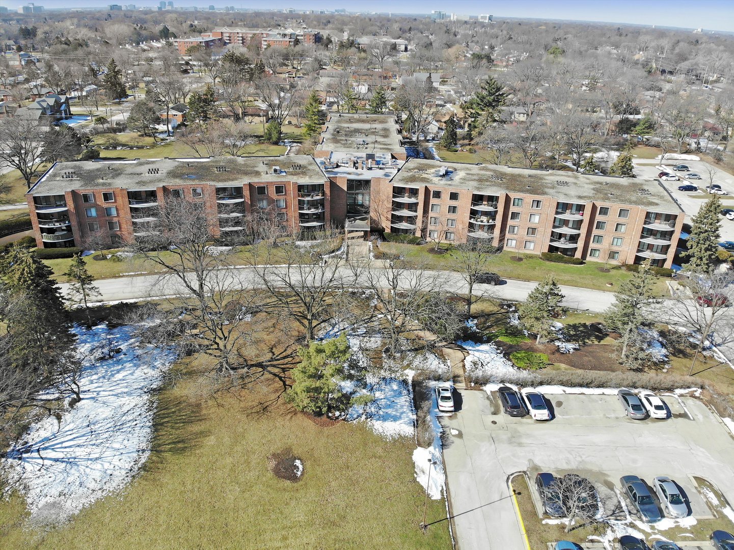 1405 East Central Road, Unit 110B Arlington Heights, IL 60005 - Photo 33 of 33 an aerial view of residential houses with outdoor space