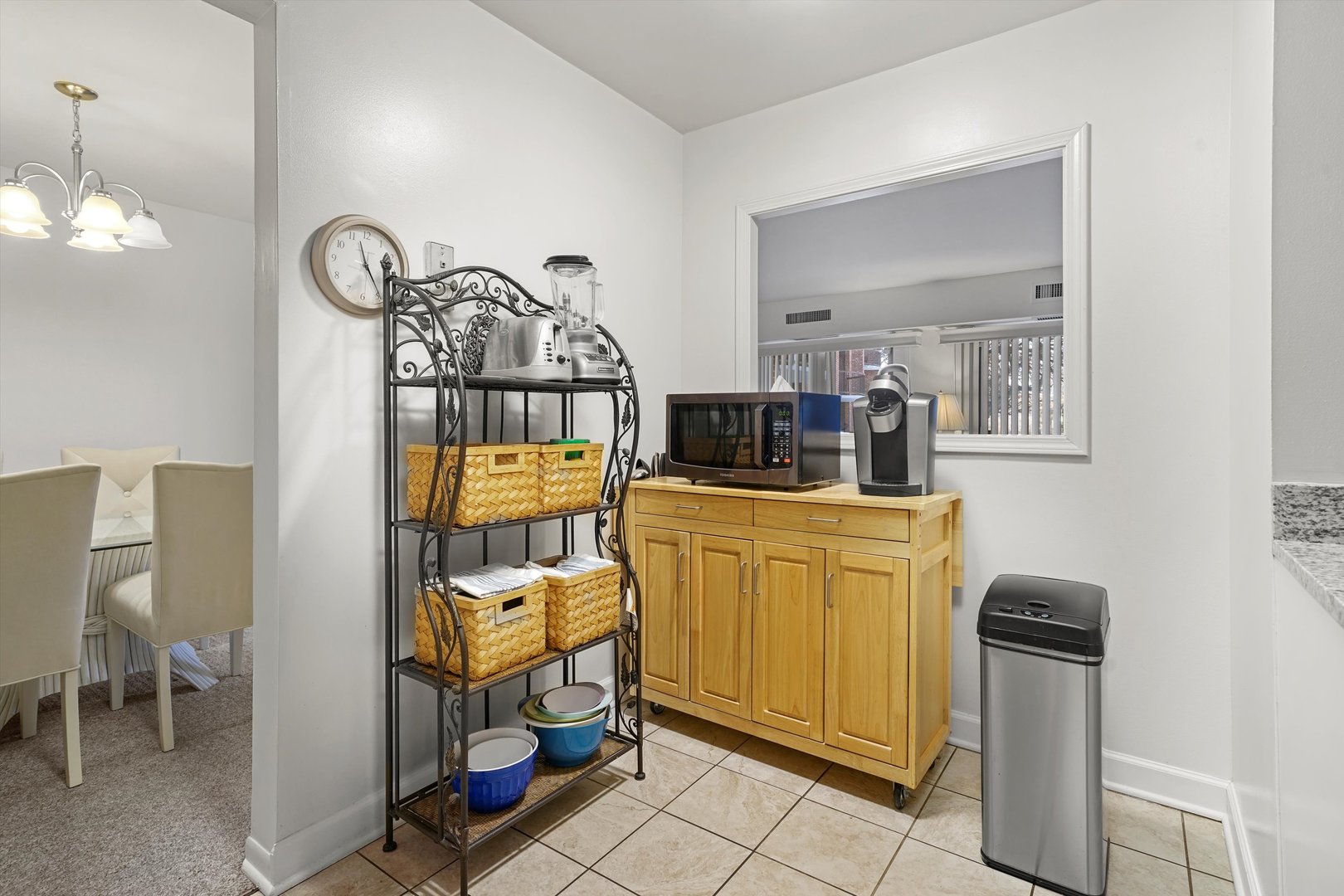 1405 East Central Road, Unit 110B Arlington Heights, IL 60005 - Photo 10 of 33 a view of a kitchen from the living room
