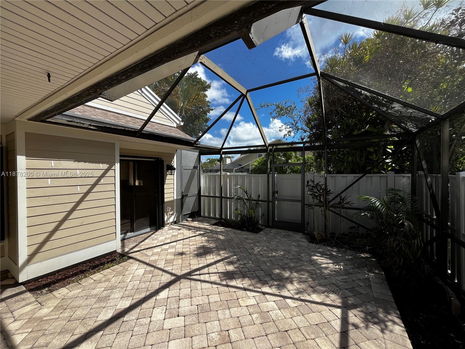 601 Summerwinds Lane Jupiter, FL 33458 - Photo 11 of 41 a view of a backyard