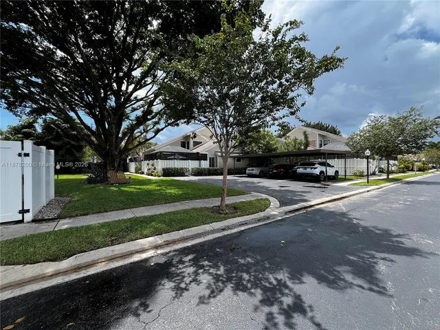 a view of street with houses