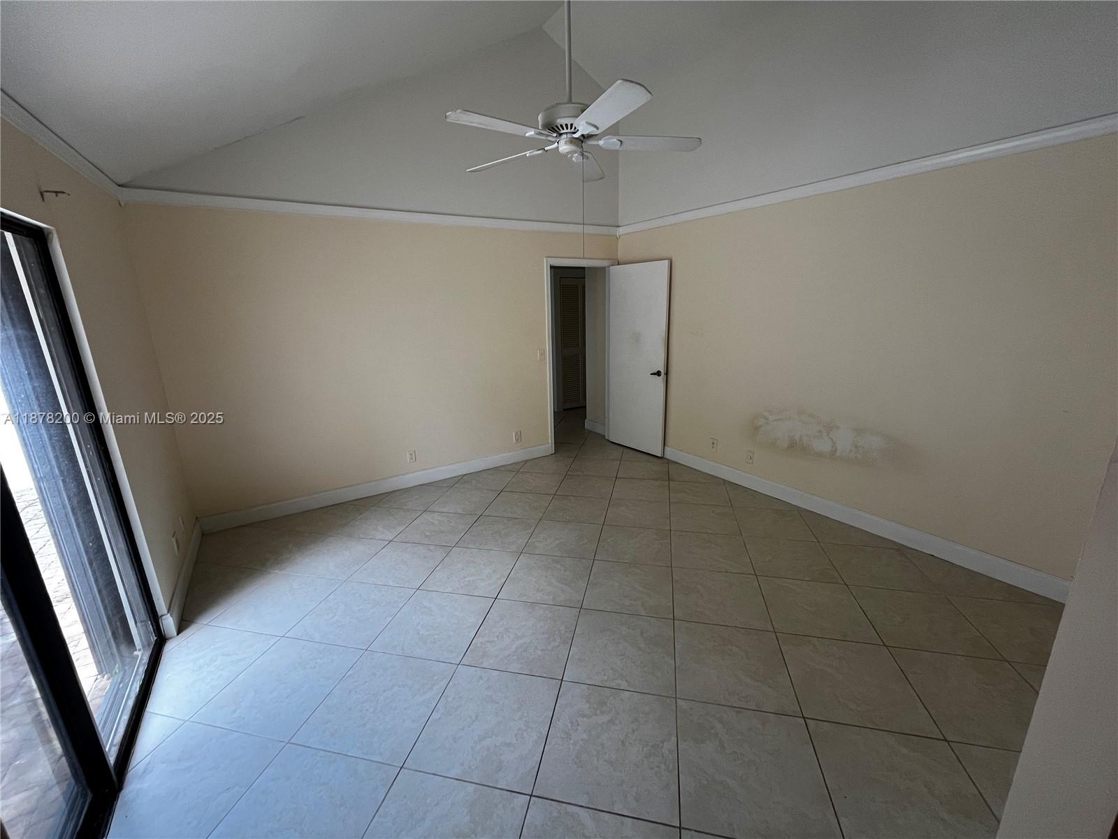 601 Summerwinds Lane Jupiter, FL 33458 - Photo 25 of 41 a view of an empty room with a window