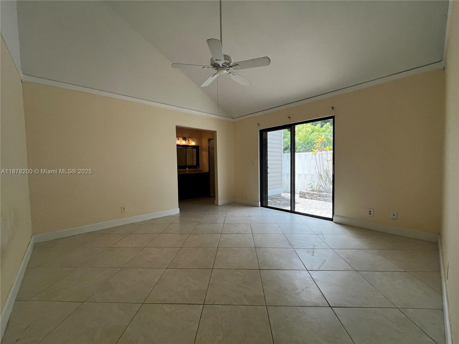 601 Summerwinds Lane Jupiter, FL 33458 - Photo 26 of 41 a view of an empty room with a window