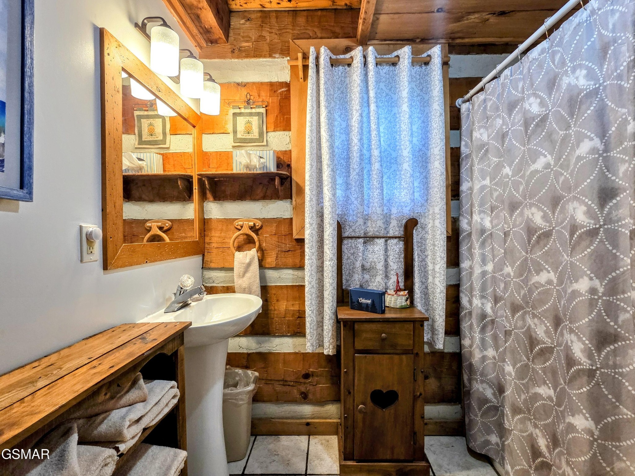 2570 Pittman Center Road Sevierville, TN 37876 - Photo 25 of 61 a bathroom with a toilet and shower