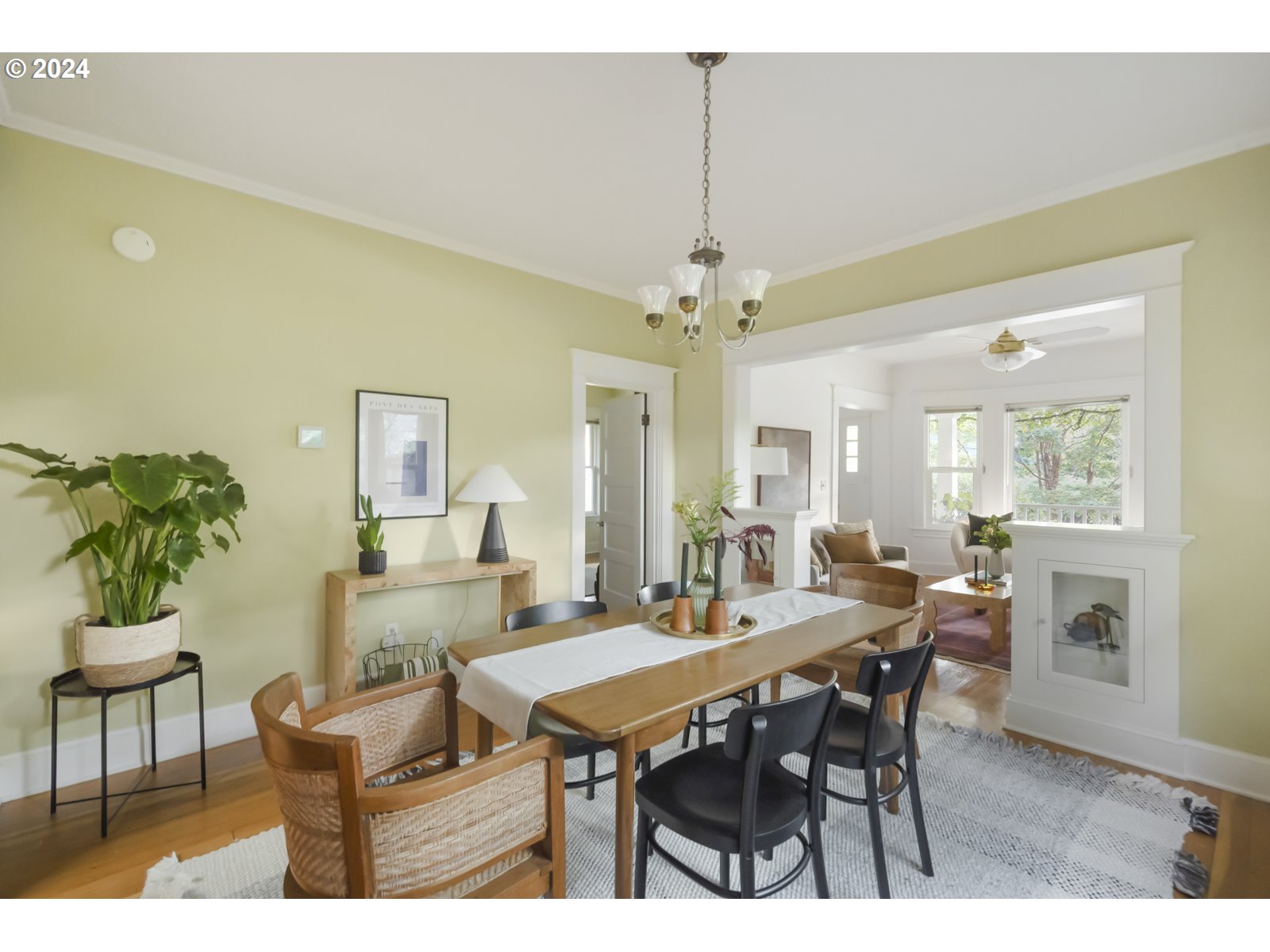 3415 Southeast Harrison Street Portland, OR 97214 - Photo 12 of 44 a view of a dining room with furniture and a chandelier