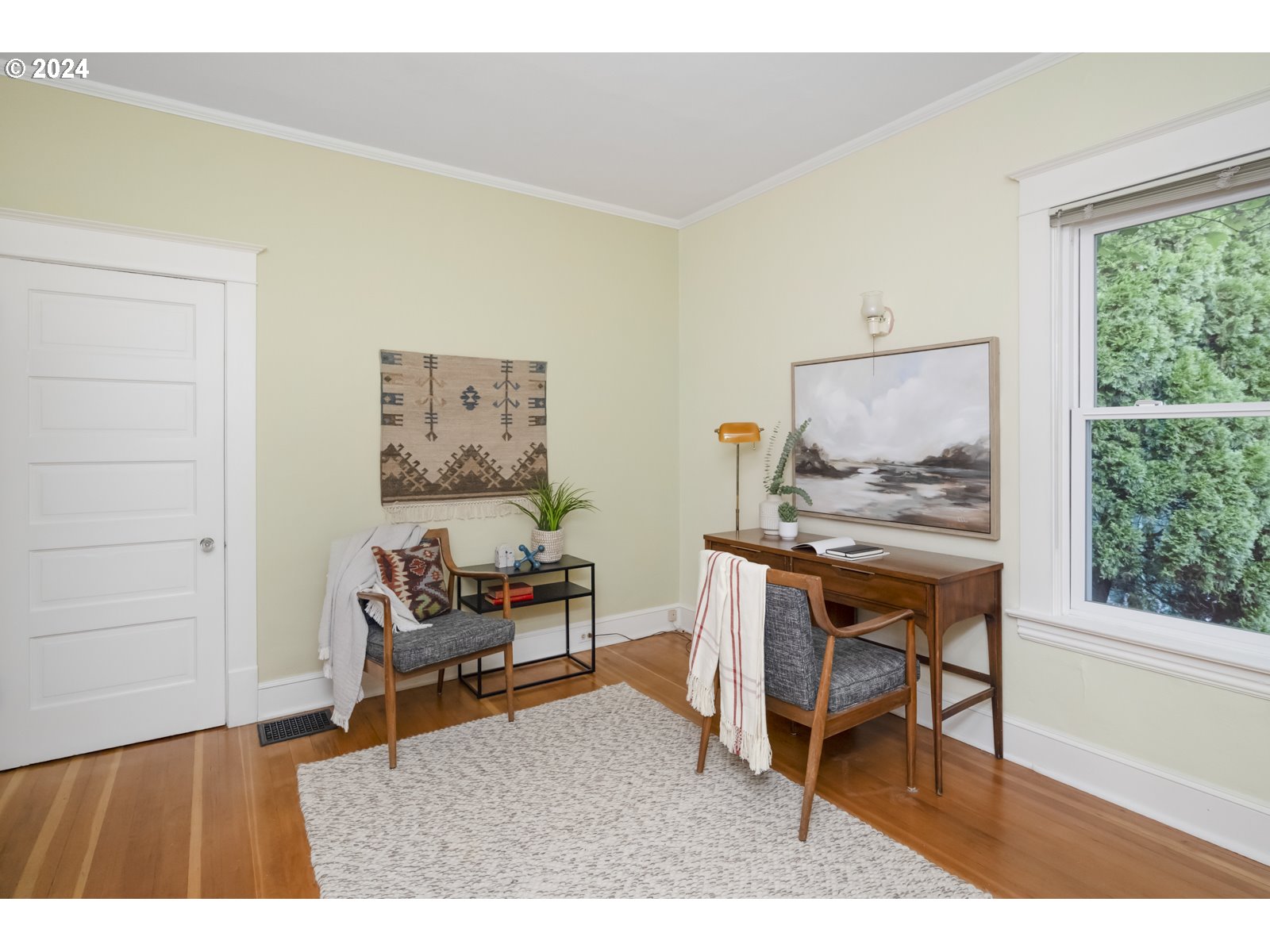 3415 Southeast Harrison Street Portland, OR 97214 - Photo 25 of 44 a living room with furniture and a window