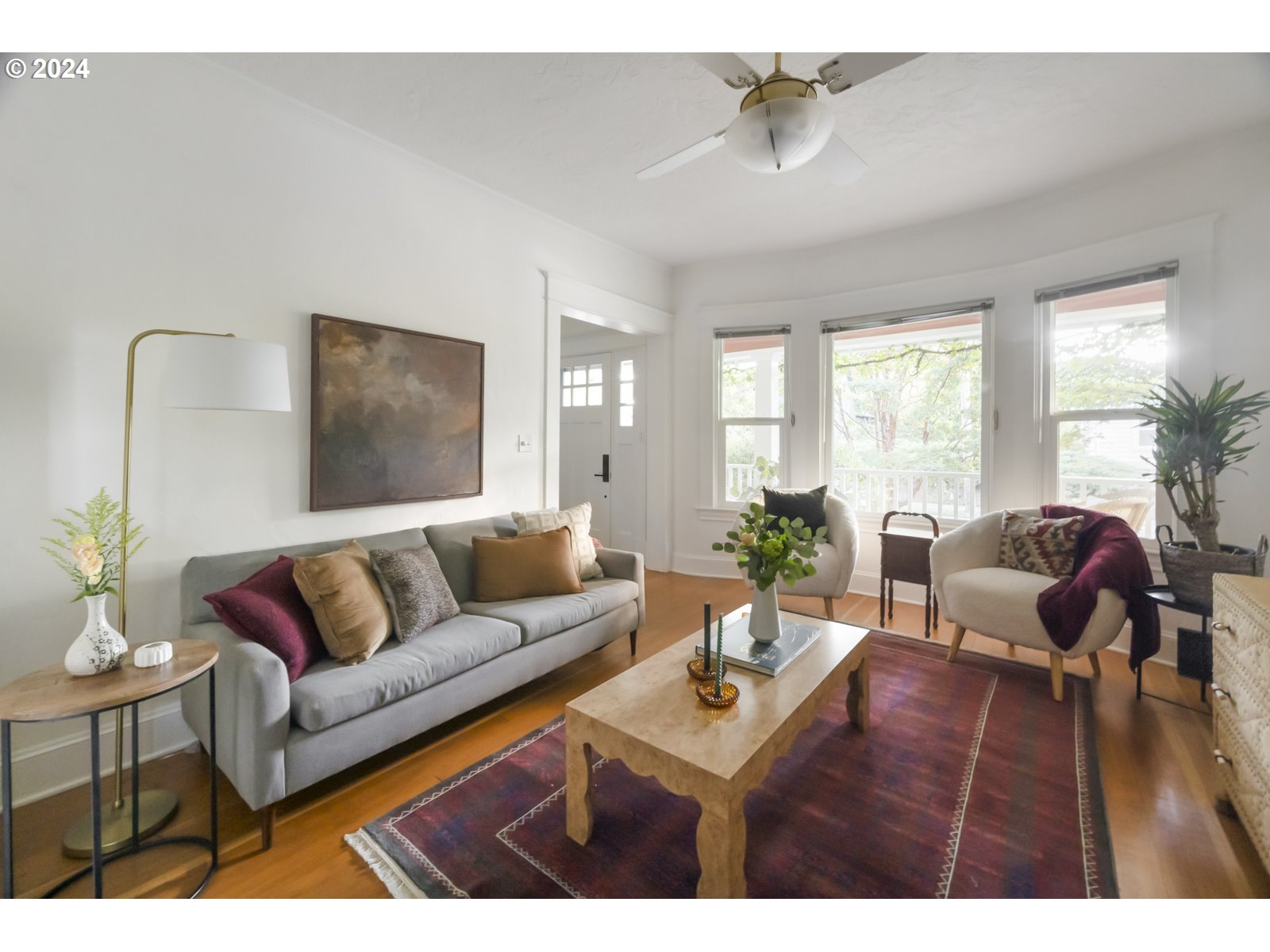 3415 Southeast Harrison Street Portland, OR 97214 - Photo 10 of 44 a living room with furniture and a large window