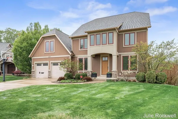 $990,000 | 4985 West Village Court Southeast, Ada, MI 49301
