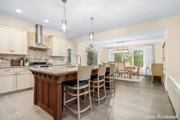 $990,000 | 4985 West Village Court Southeast, Ada, MI 49301