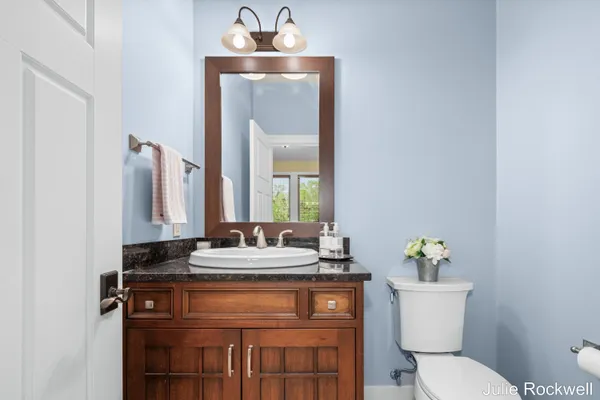 $990,000 | 4985 West Village Court Southeast, Ada, MI 49301