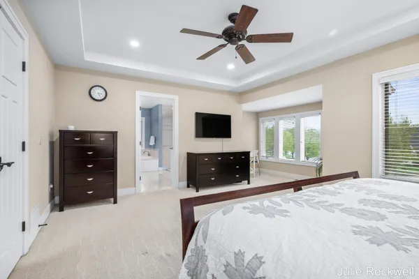 $990,000 | 4985 West Village Court Southeast, Ada, MI 49301