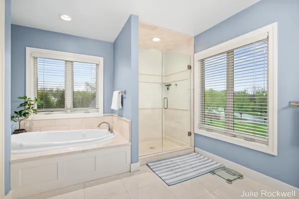 $990,000 | 4985 West Village Court Southeast, Ada, MI 49301