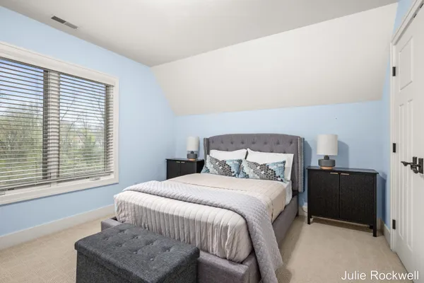 $990,000 | 4985 West Village Court Southeast, Ada, MI 49301