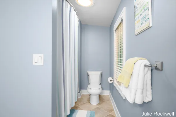 $990,000 | 4985 West Village Court Southeast, Ada, MI 49301