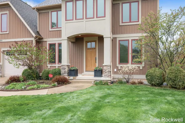 $990,000 | 4985 West Village Court Southeast, Ada, MI 49301