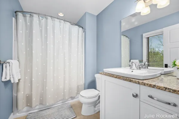 $990,000 | 4985 West Village Court Southeast, Ada, MI 49301