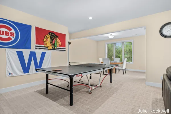 $990,000 | 4985 West Village Court Southeast, Ada, MI 49301