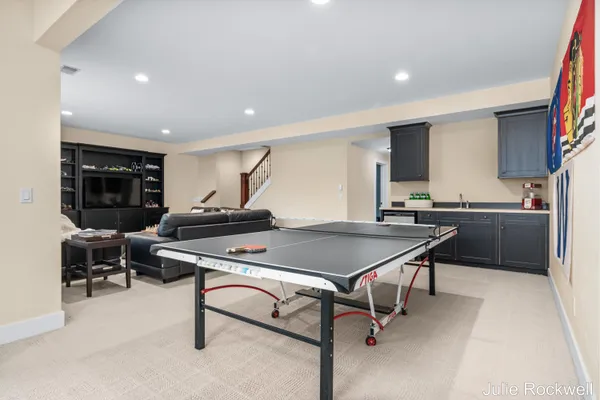 $990,000 | 4985 West Village Court Southeast, Ada, MI 49301