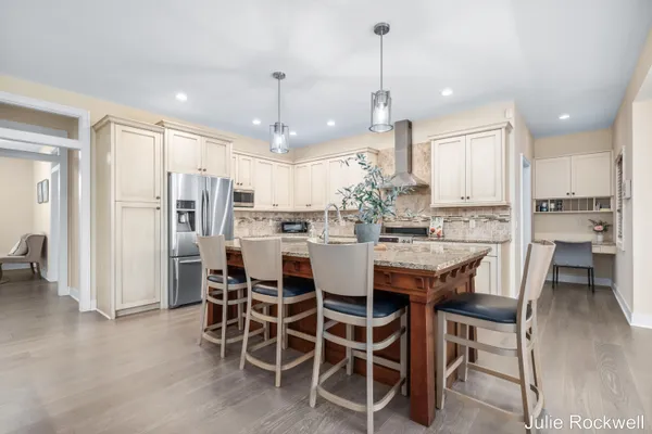 $990,000 | 4985 West Village Court Southeast, Ada, MI 49301