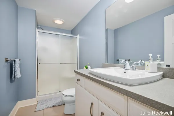$990,000 | 4985 West Village Court Southeast, Ada, MI 49301